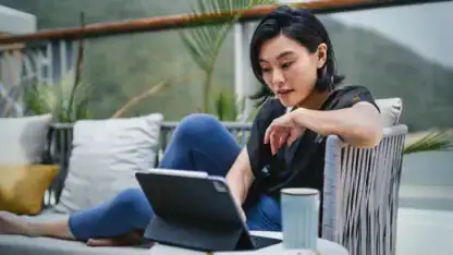 Young woman using computer for business to analyze financial statements